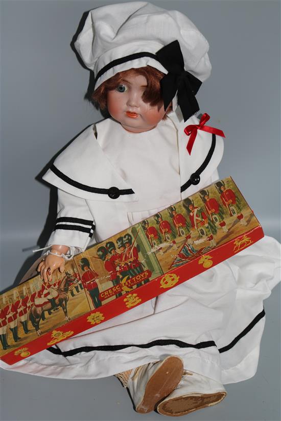 Bisque head doll & military figures